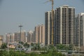 Wide angle shot of several skyscrapers built next to each other under during daytime Royalty Free Stock Photo