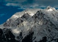 Wide angle shot of snow covered mountain top Royalty Free Stock Photo