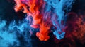 Wide-angle shot of swirling red and blue acrylic colors interacting in water, creating a vivid abstract ink blot effect Royalty Free Stock Photo