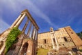 Wide angle shot of the Temple of Saturn and the Tabularium building in the Roman Forum Royalty Free Stock Photo