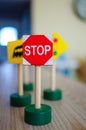 Wide angle shot of toys of several traffic signs next to each other