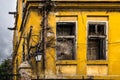 Wide angle shot of a yellow abandoned building in Bulgaria