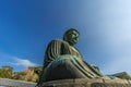 Wide angle side view of The Great Buddha (Daibutsu) of Kamakura, Japan