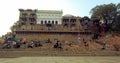 Wide angle stairs at Ganga Ghat people at holy ghats ancient hindu temples in early morning in Varanasi Evening at Banaras Ghat