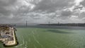 Wide top view 25 de Abril Bridge in Lisbon over Tagus river