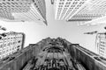 Wide angle upward view of Trinity Church at Broadway and Wall Street with surrounding skyscrapers, Lower Manhattan, New Royalty Free Stock Photo