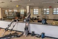 Wide angle view of abandoned ski storage room