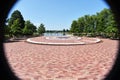 Wide angle view of brick pathway and landscape