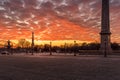 Wide angle view of Egyptian Luxor Obelisk Pillar with hieroglyphics in silhouette at the centre of Place de la Concorde in Paris Royalty Free Stock Photo