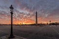 Wide angle view of Egyptian Luxor Obelisk Pillar with hieroglyphics in silhouette at the centre of Place de la Concorde in Paris Royalty Free Stock Photo