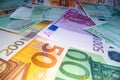 Wide angle view of euro notes background stacked on top of each other. Euro money banknotes, pile of money, cash, stack of bills. Royalty Free Stock Photo