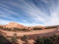 Wide angle view of the fortified village of Ait Ben Haddou with incredible clouds, near Ourzazate, in Morocco Royalty Free Stock Photo