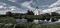 Wide angle view of the Intercession church on Nerl river near Vladimir and its reflection in swamp Royalty Free Stock Photo