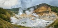 wide angle view of jigokudani hot spring valley in sapporo hokkaido one of most popular natural traveling destination Royalty Free Stock Photo