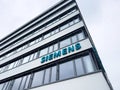 Wide-Angle View of Large Siemens Logotype on Building Facade