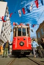 Wide angle view of nostalgic tram in Istiklal Avenue in Sishane district.