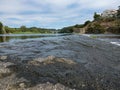 Wide angle view over River Ave in Vila do Conde, Portugal on a bright summer day with blue sky Royalty Free Stock Photo