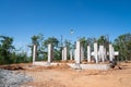 Wide angle view of reinforced concrete foundation and column for a huge statue at a construction site Royalty Free Stock Photo