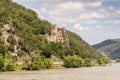 Wide angle view of Rheinstein Castle in Germany from the river Rhine in bright sunshine on a sunny summer\'s day Royalty Free Stock Photo