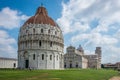 Wide angle view of Romanesque Baptistery of St. John Baptistry at Piazza dei Miracoli Piazza del Duomo popular tourist attraction