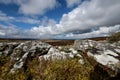 A wide angled view out over the picturesque Dartmoor national park on a bright spring day. Dramatic cumulus clouds