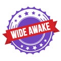WIDE AWAKE text on red violet ribbon stamp Royalty Free Stock Photo