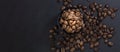 Wide banner for a coffee shop or restaurant, coffee beans with highlighted focus and light on black, place for text, top view,