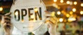 Wide banner. waitress staff woman wearing protection face mask turning open sign board on glass door Royalty Free Stock Photo