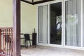 Wide concrete floor balcony in front of the house