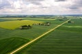 Wide countryside before the storm, top view of green agricultural fields and road Royalty Free Stock Photo