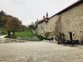 The wide courtyard in front of the Loka Castle uphill walkway in Slovenia. Royalty Free Stock Photo