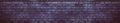 Wide dark violet brick wall gloomy grunge background Royalty Free Stock Photo