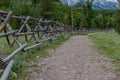 Wide Dirt Trail Along Wooden Fence Royalty Free Stock Photo