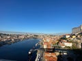 Wide Douro river with some boats sailing in a beautiful skyline from the city Porto, in Portugal