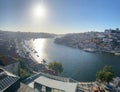 Wide Douro river with some boats sailing in a beautiful skyline from the city Porto, in Portugal