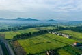 Wide expanse of rice fields with beautiful mountain views
