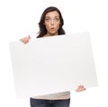 Wide Eyed Mixed Race Female Holding Blank Sign on White