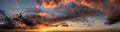 Wide fire cloud sunset, panorama Royalty Free Stock Photo