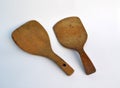 Wide flat antique wooden butter paddles
