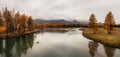 Wide flood of the river. Beautiful misty mountain landscape with wide Argut river. Gloomy scenery with big mountain river in mist