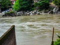 Wide Ganga river flowing having brown colour water in Haridwar India