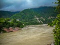 Wide Ganga river view with hills surround with clouds. Wide Ganga view in Rishikesh India