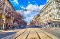 The wide Grand Boulevard or Big Ring Road with tram lines and high buildings in Budapest, Hungary