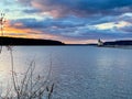 Wide horizontal sunrise view of the historic Rondout Light, a lighthouse on the west side of