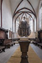 Wide interior view of the Church of the Dominican Monastery in Sighisoara. Vertical framing