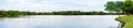 wide lake in tropical park Royalty Free Stock Photo