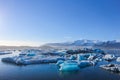 Wide landscape of icebergs floating on the water under the very clear blue sky with copy space Royalty Free Stock Photo