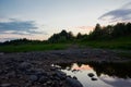 wide landscape with river bank at sunset Royalty Free Stock Photo