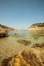 A wide lens landscape view at the beach in Anthony Quinn bays clear waters in Rhodes, Greece