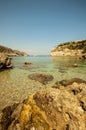 A wide lens landscape view at the beach in Anthony Quinn bays clear waters in Rhodes, Greece